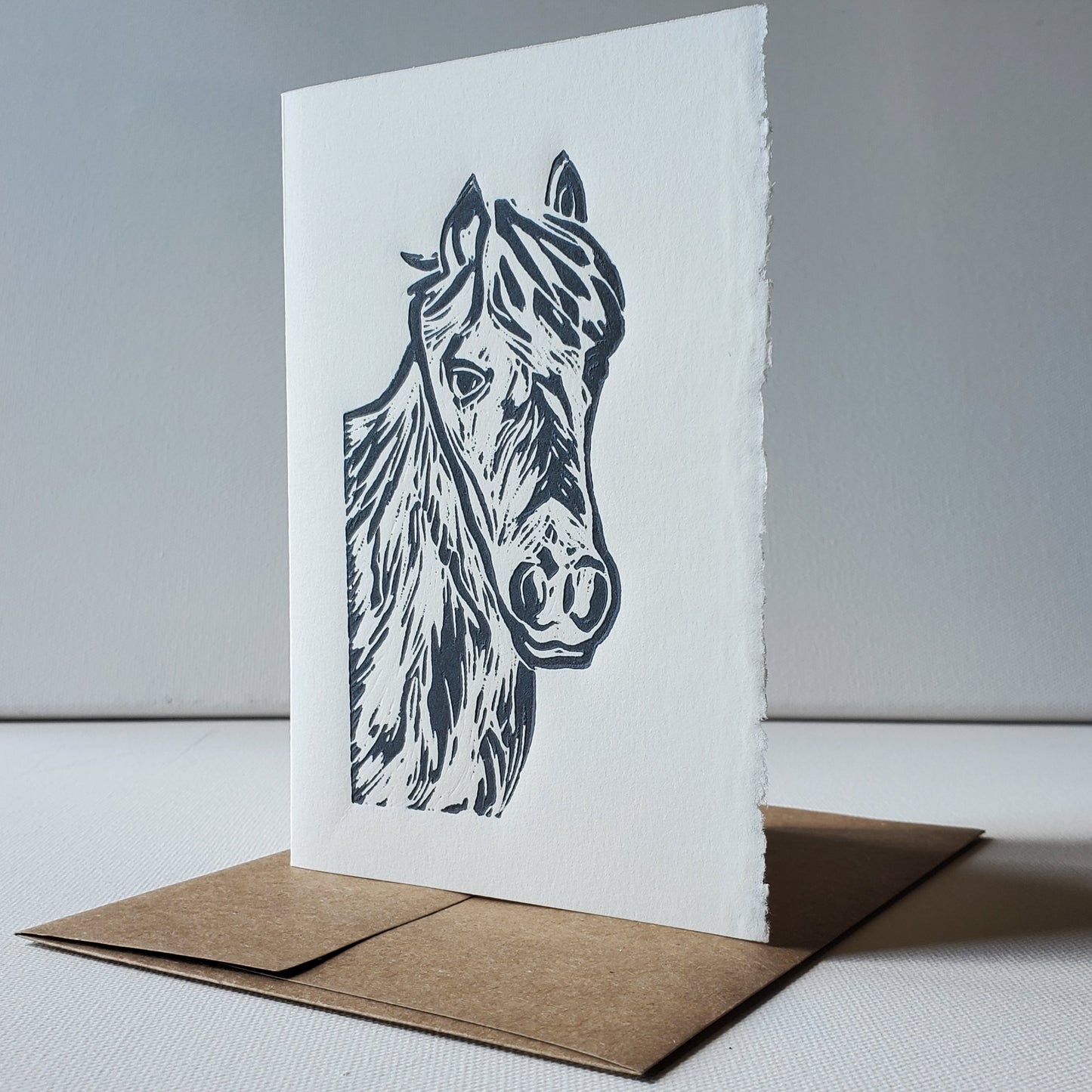 Norton's Cove note card with Janet Davis' Newfoundland Pony linocut image printed in grey ink