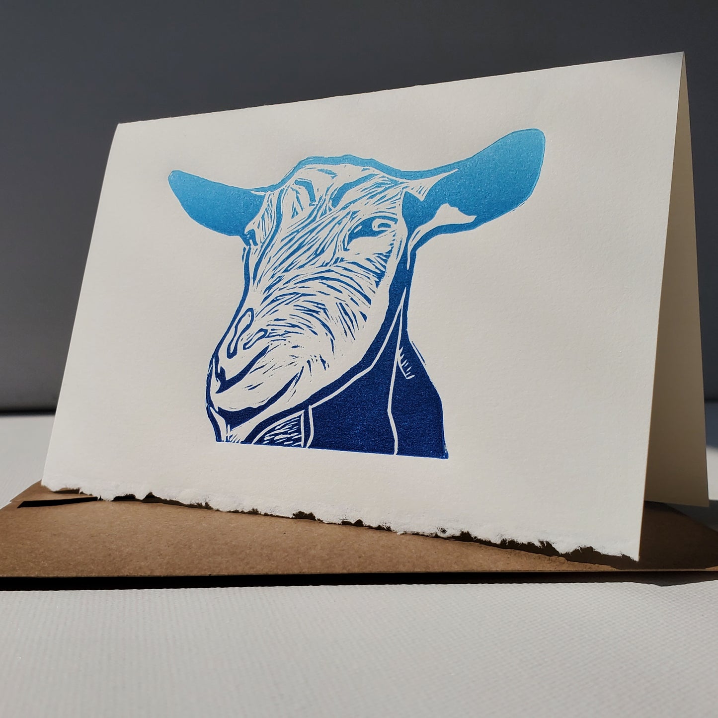 Janet Davis' Old Paterson's Goat design as a Norton's Cove Card in Blue ink