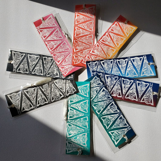 A selection of salt fish bookmarks printed in various colours.