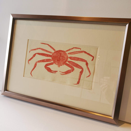 Snow Crab linocut image printed on cream paper using watercolour paints and an etching press.  Framed in metallic finish.