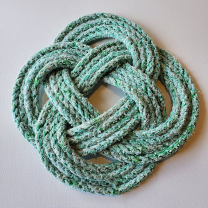 This is a Carrick Bend knot made with discarded rope from the fishing industry in NL.