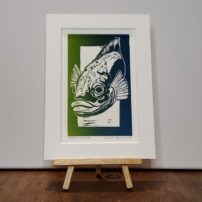 Norton's Cove Mini-Print by Janet Davis, 2025.  Cunner lino-cut printed in blue-green ink.