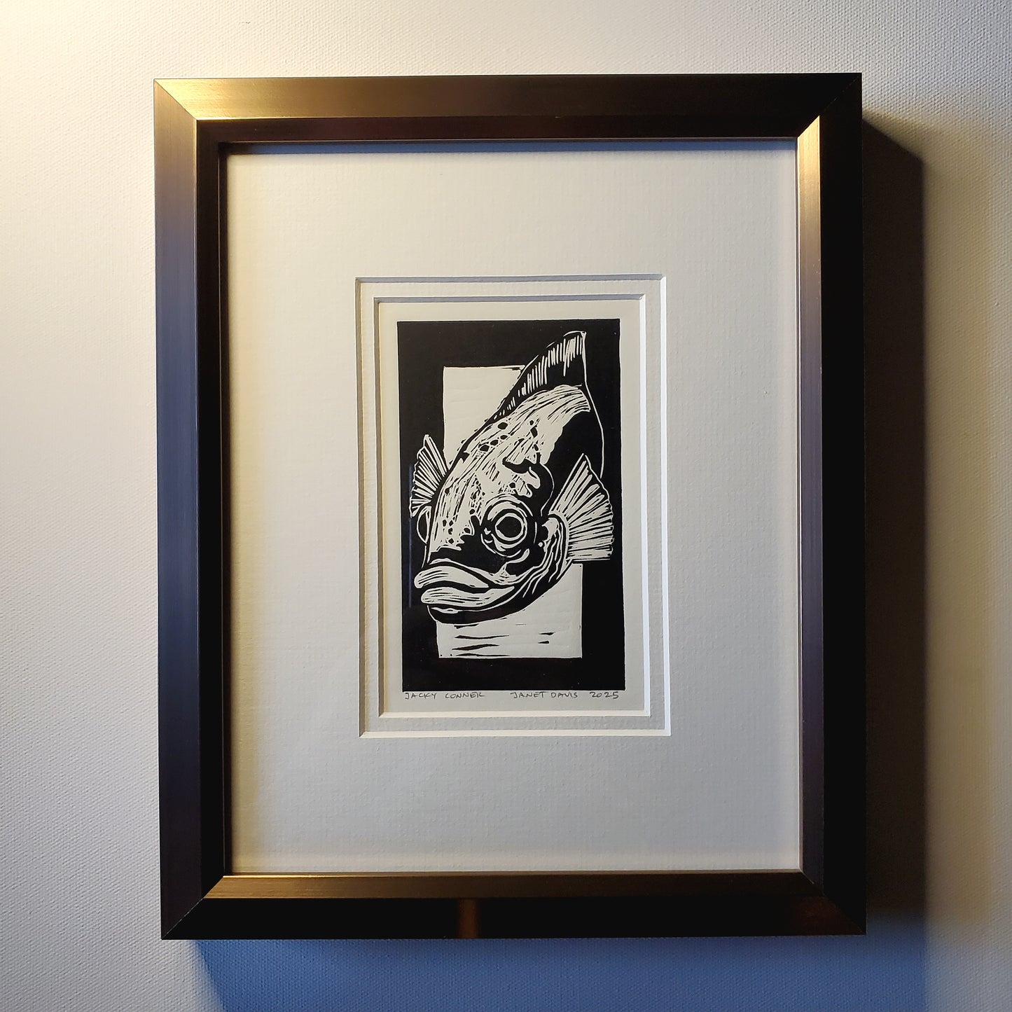 Framed Jacky Conner lino-cut print by Janet Davis- copper/bronze wooden frame.