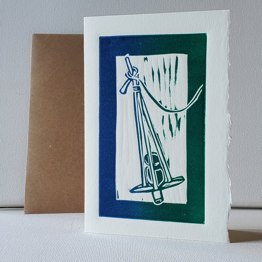 Norton's Cove Card Killick design in blue-green rainbow roll ink