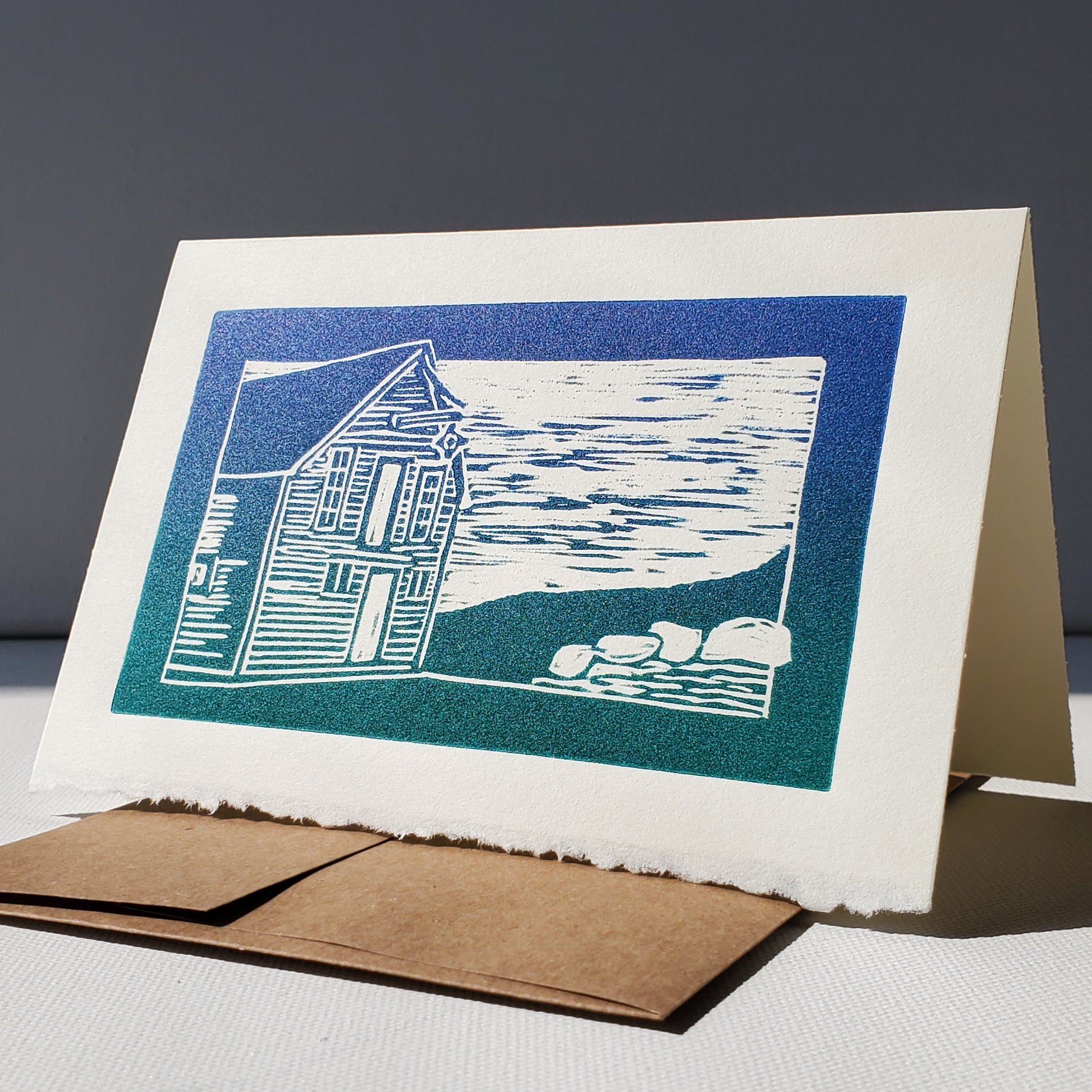 Janet Davis' Sainsbury's Store design printed as a Norton's Cove Card in a blue-green rainbow roll