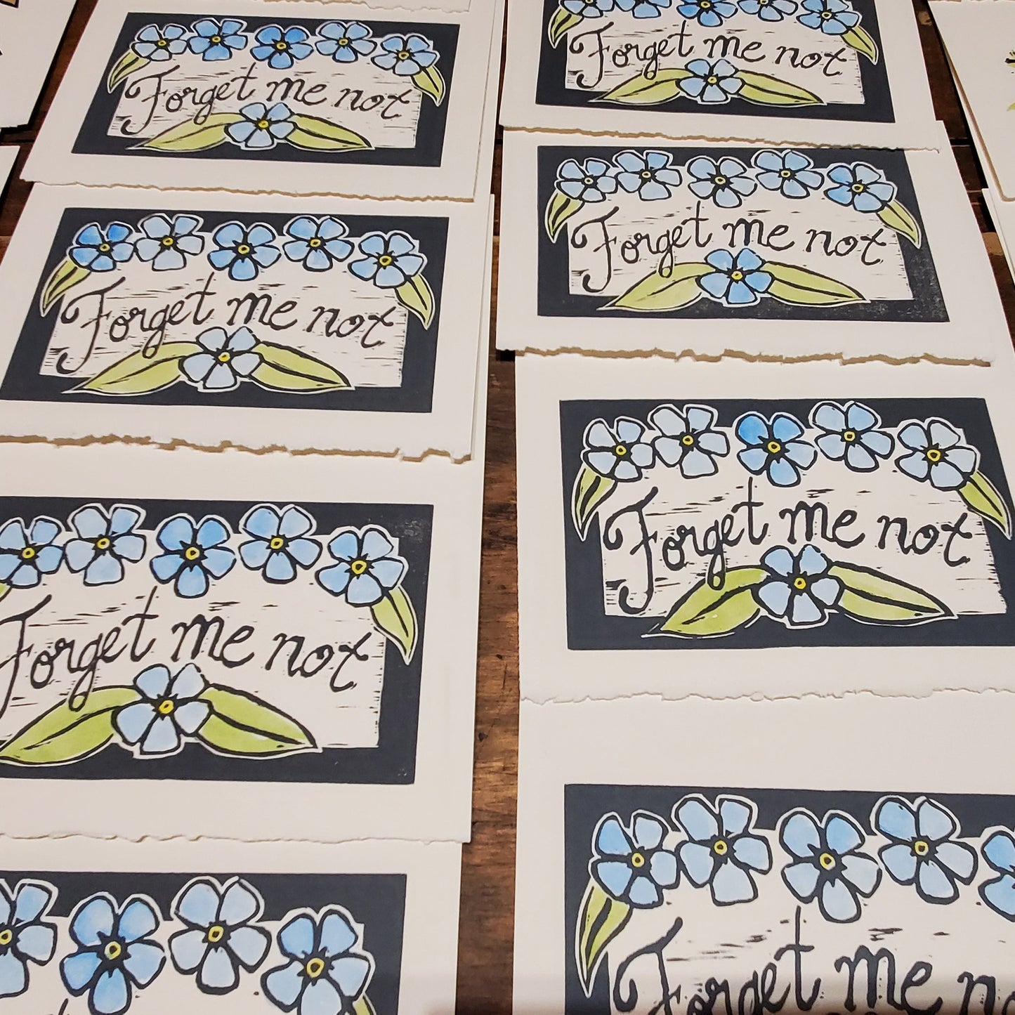 Forget-me-not cards in production at Norton's Cove Studio 2023