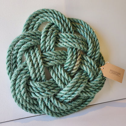 This decorative knot was made using discarded rope used in the lobster fishery in Newfoundland.
