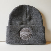 Grey toque with Norton's Cove Studio & Café logo embroidered on the rolled cuff in white thread.  