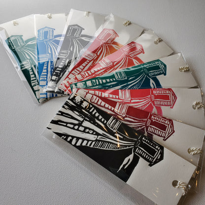 Assortment of available colours of Store Path Bookmark: green, blue, black, red-yellow, orange, red, red-blue, blue-green